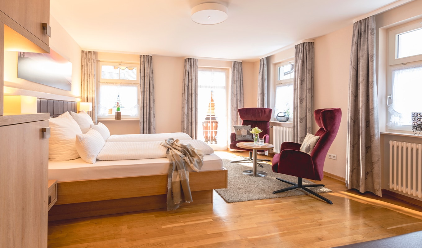 Wohlfühl-Doppelzimmer mit Balkon Schlafbereich