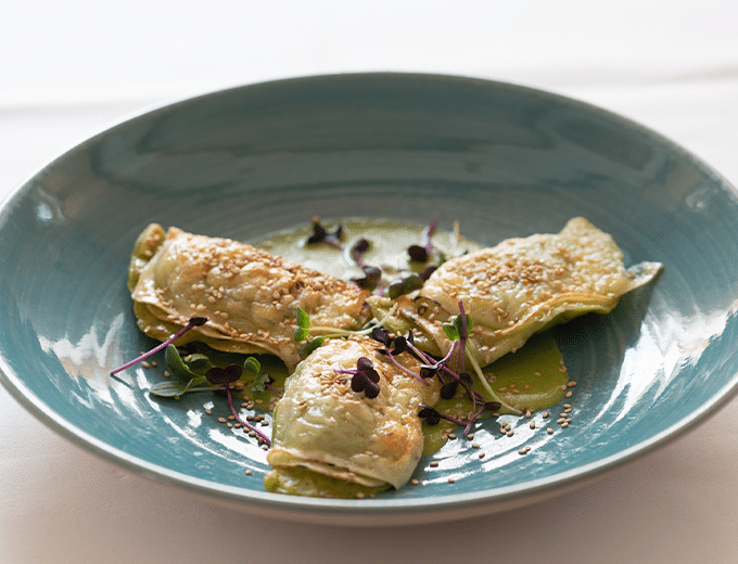 Fried Maultaschen with herb sauce, sesame and sprouts at Restaurant Belchenblick